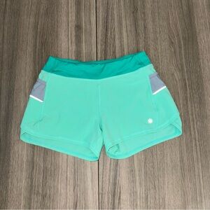 Athleta Girl Aqua Athletic Shorts Size L (12) Mini Pocket Zip Back EUC